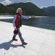 Christo walks on the lake’s path before it is covered in orange fabric. (Image: AP Photo/Luca Bruno)